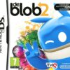 Framsidan av spelboxen till det hadhållna TV-spelet De Blob 2 på Nintendo DS i europeisk PAL utgåva