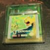 Framsidan av kassetten till det handhålna konsolspelet Disneys's dinosaurs på Nintendo game boy color (GBC)